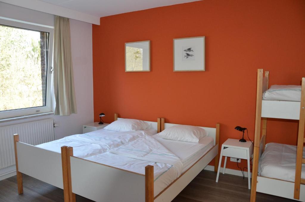 Postel nebo postele na pokoji v ubytování Auberge des 3 Fontaines
