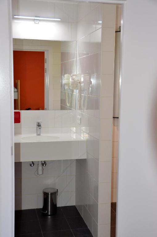Koupelna v ubytování Auberge des 3 Fontaines