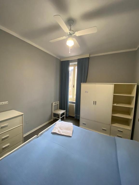 Postel nebo postele na pokoji v ubytování HOTEL LA LOGGIA