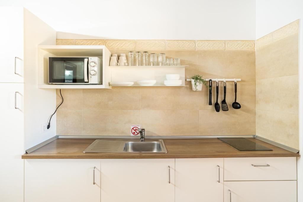 Kuchnia lub aneks kuchenny w obiekcie Apartamento Jibazahora Piscis
