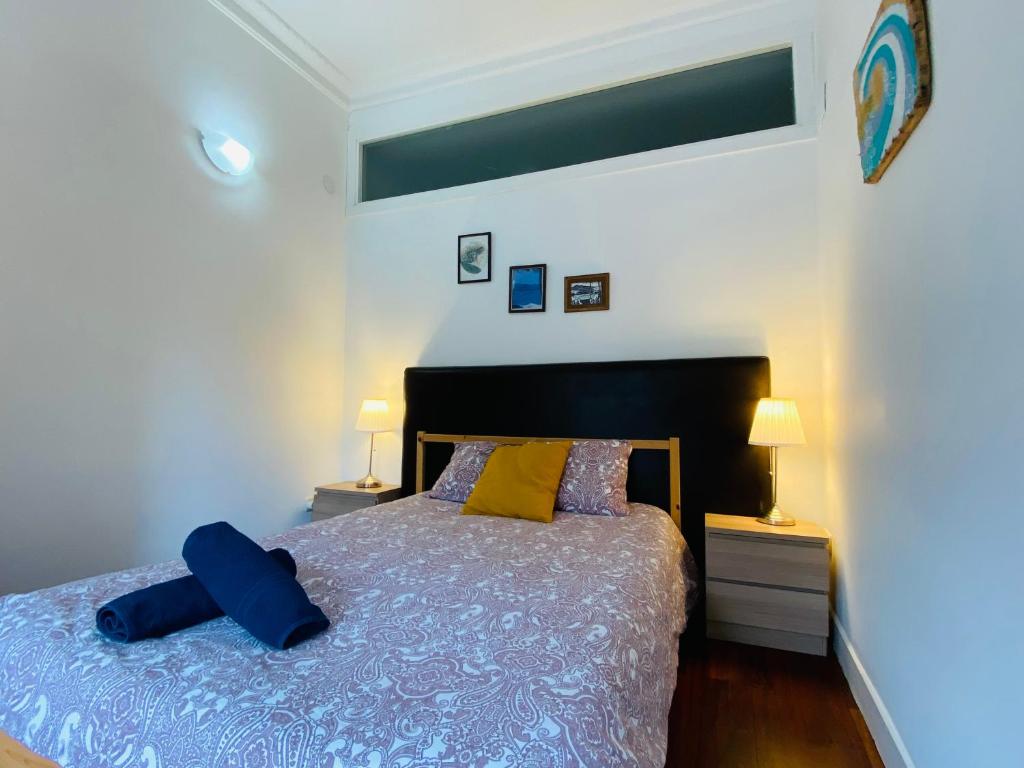 Posteľ alebo postele v izbe v ubytovaní La plaza apartment