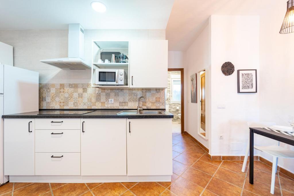Kuchnia lub aneks kuchenny w obiekcie Apartamento Jibazahora B1