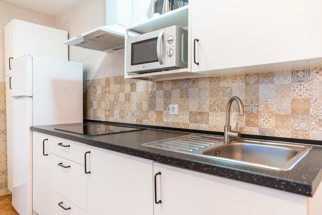 Kuchnia lub aneks kuchenny w obiekcie Apartamento Jibazahora B1