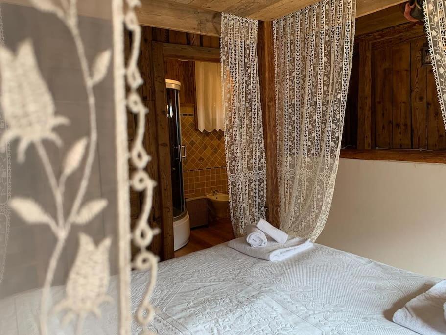 Voodi või voodid majutusasutuse Chalet La Rite Dolomiti toas