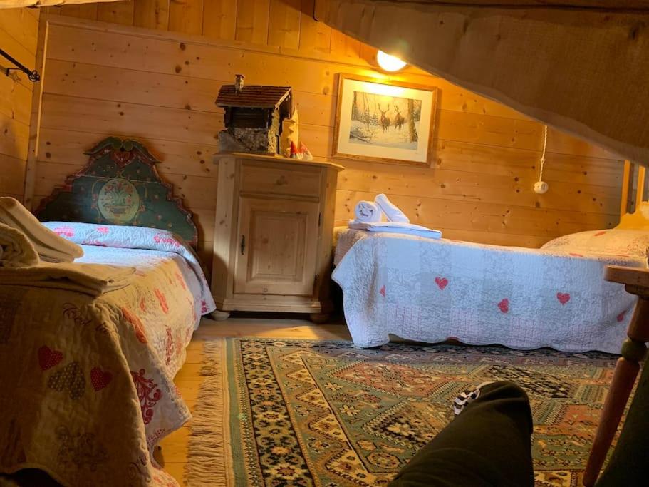Voodi või voodid majutusasutuse Chalet La Rite Dolomiti toas