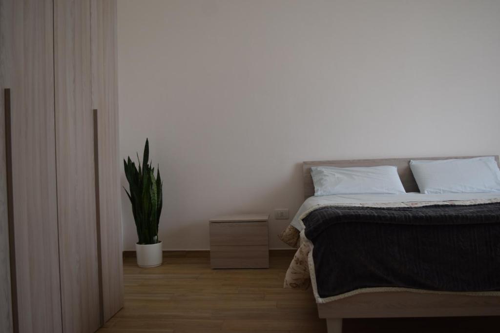 Łóżko lub łóżka w pokoju w obiekcie Residenza Lo Bello Vedere