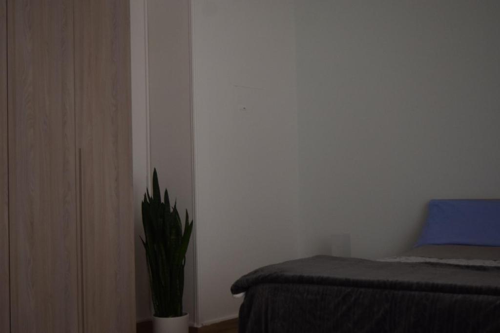 Łóżko lub łóżka w pokoju w obiekcie Residenza Lo Bello Vedere