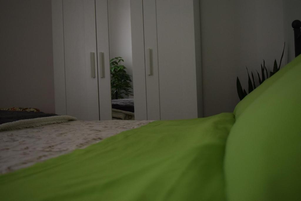 Łóżko lub łóżka w pokoju w obiekcie Residenza Lo Bello Vedere
