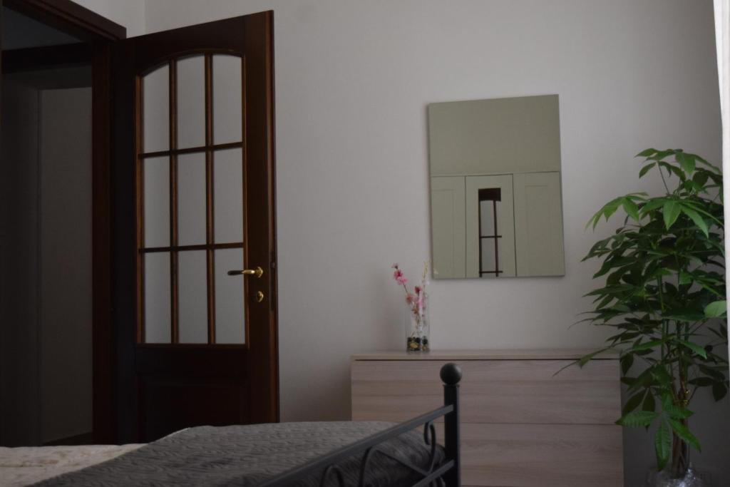 Łóżko lub łóżka w pokoju w obiekcie Residenza Lo Bello Vedere
