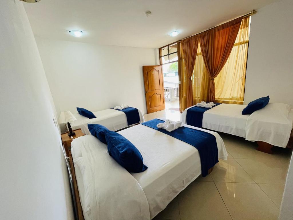 Postel nebo postele na pokoji v ubytování Fernandina Hotel & Spa