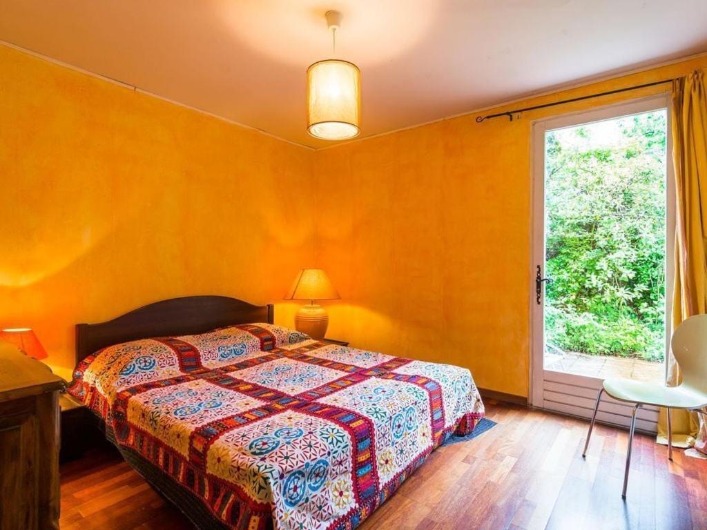 Posteľ alebo postele v izbe v ubytovaní Adorable villa avec piscine nichée dans la pinède