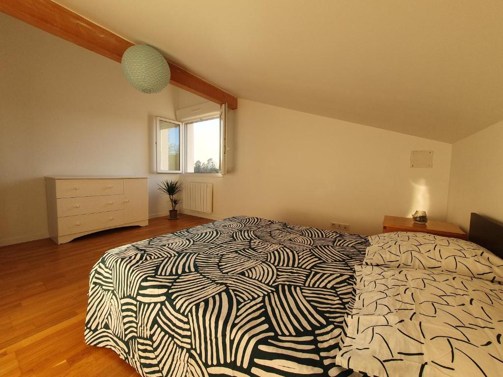 Postel nebo postele na pokoji v ubytování Maison à Tosse proche des plages
