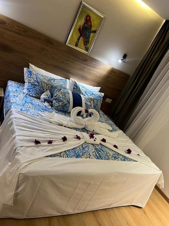 Postel nebo postele na pokoji v ubytování Hotel beaux arts