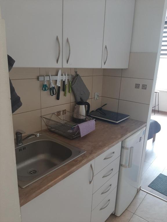 Kuchyňa alebo kuchynka v ubytovaní Apartamenty Marco 3 przy Dworcu-Stare Miasto-Super Wi Fi