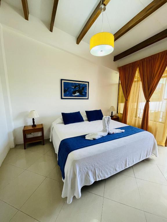 Postel nebo postele na pokoji v ubytování Fernandina Hotel & Spa
