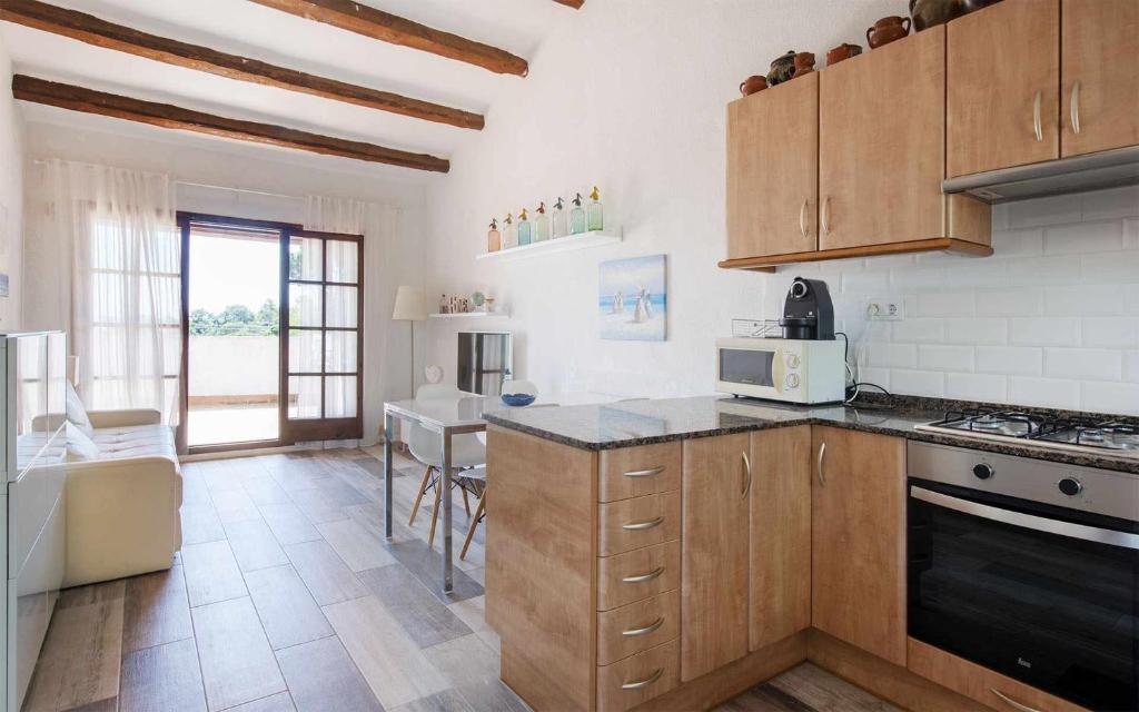 Kuchyňa alebo kuchynka v ubytovaní Casas Blanca 34 piscina Playa privada wifi