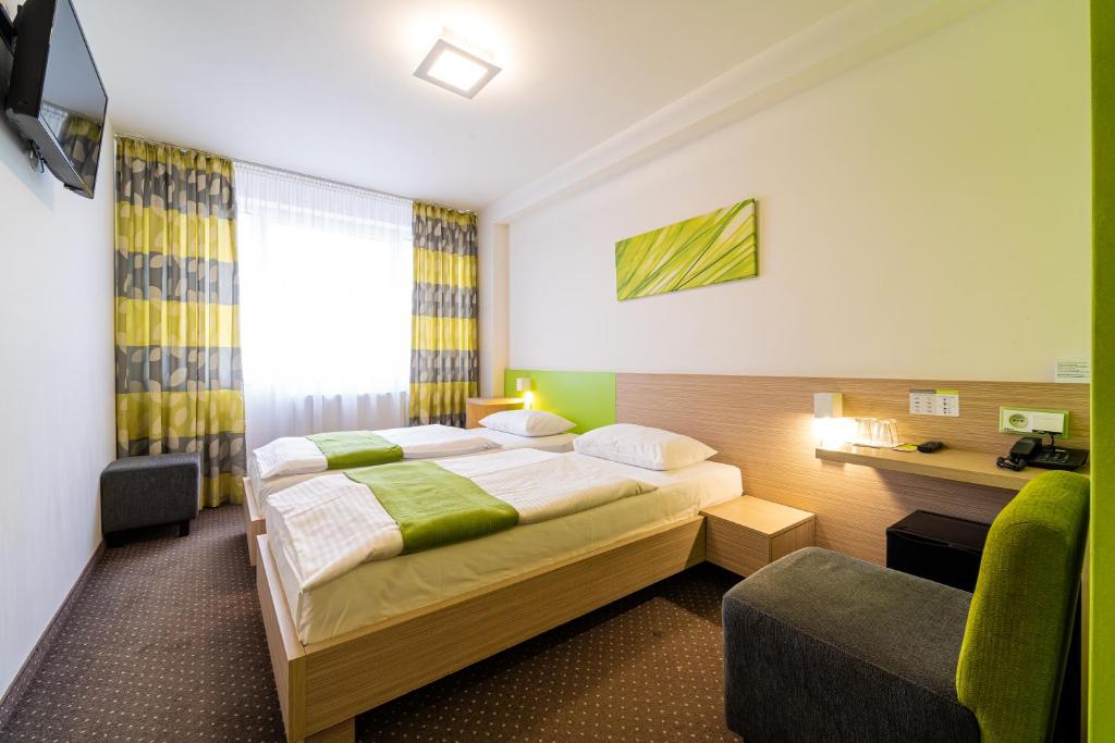 Postel nebo postele na pokoji v ubytování Hotel Ali Baba