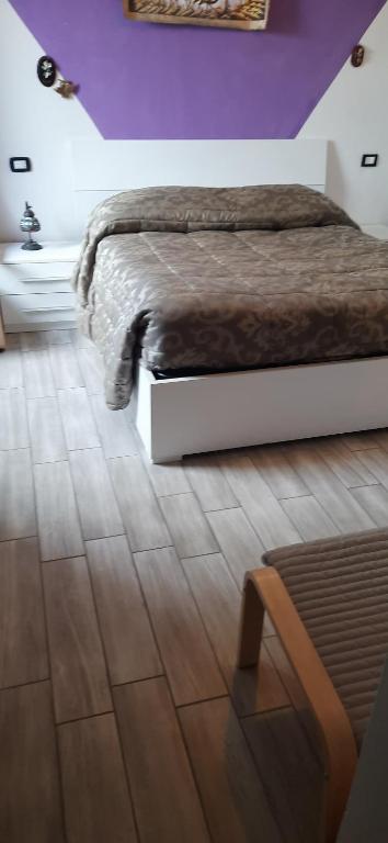 Postel nebo postele na pokoji v ubytování L'antica torre