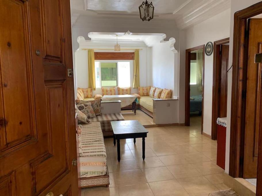 Posezení v ubytování Superbe appartement chaleureux à 350m de la plage