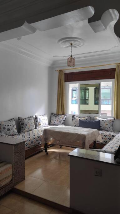 Posezení v ubytování Superbe appartement chaleureux à 350m de la plage