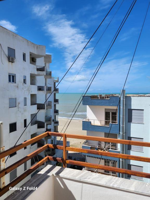 a balcony with a view of the beach at A&K Sea View Apartament 6 in Durrës