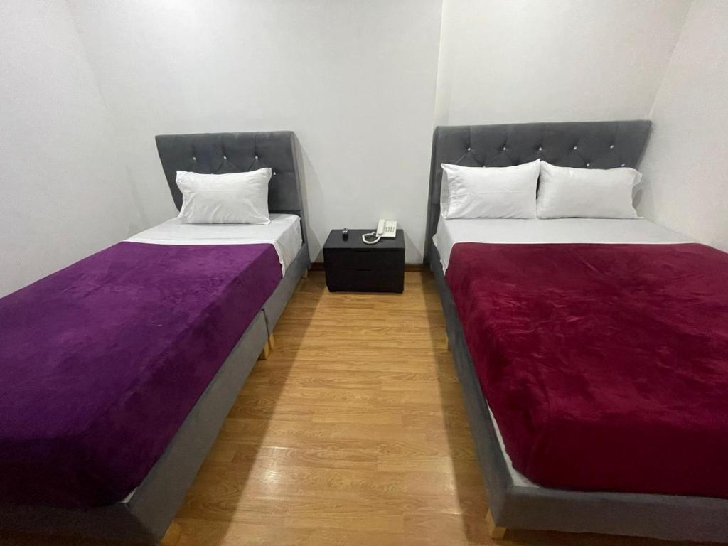 Postel nebo postele na pokoji v ubytování Hotel Casa Morada 63