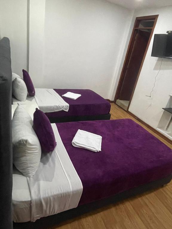 Postel nebo postele na pokoji v ubytování Hotel Casa Morada 63