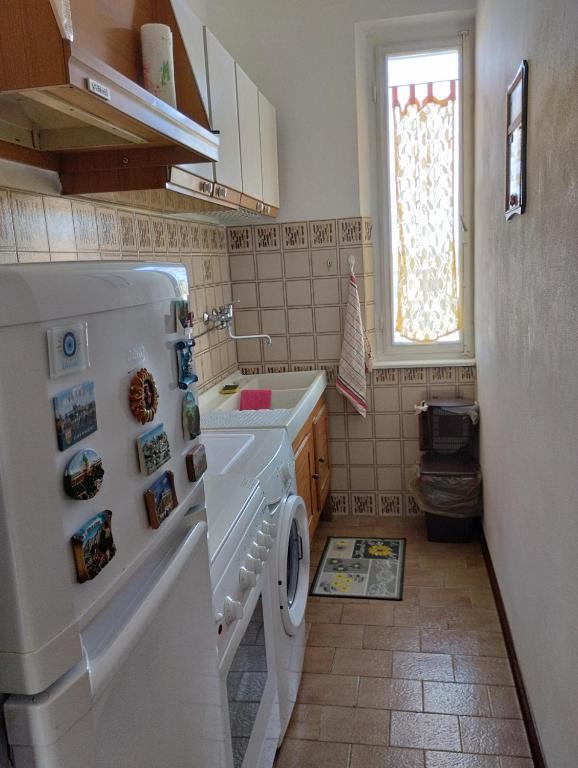Kuchyňa alebo kuchynka v ubytovaní Casa Graziella