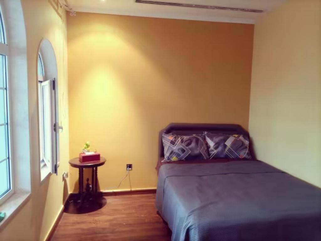 Postel nebo postele na pokoji v ubytování Private room in Garden Villa