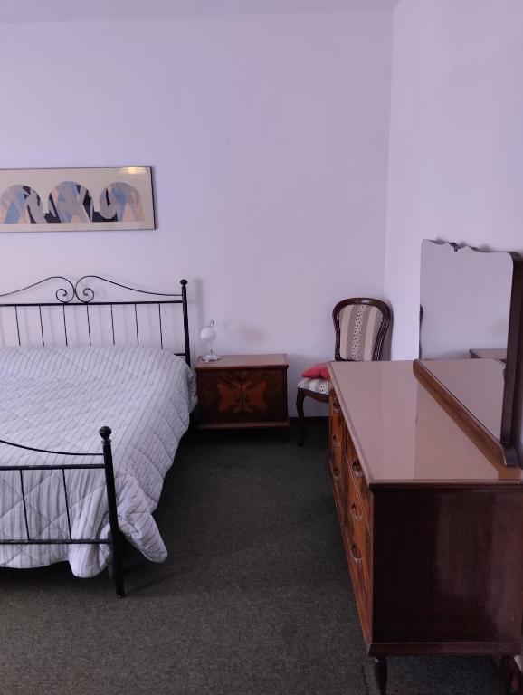 Posteľ alebo postele v izbe v ubytovaní Casa Graziella