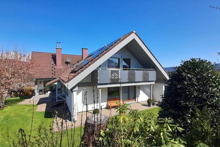 a large white house with a balcony on it at Apartment in Kleines Wiesental, Sallneck in Sallneck