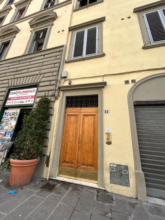 The facade or entrance of Home Cavour Florence