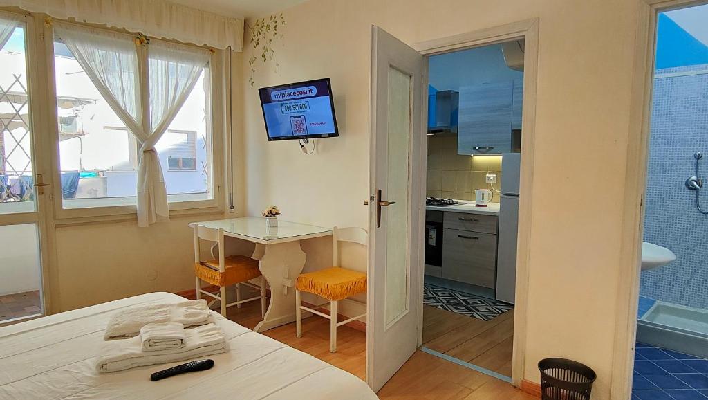 Postel nebo postele na pokoji v ubytování Elisart Guest House