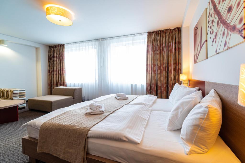 Postel nebo postele na pokoji v ubytování Hotel Ali Baba