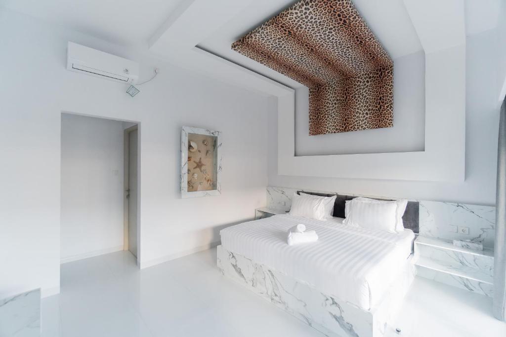 Postel nebo postele na pokoji v ubytování Sea Shell Resort