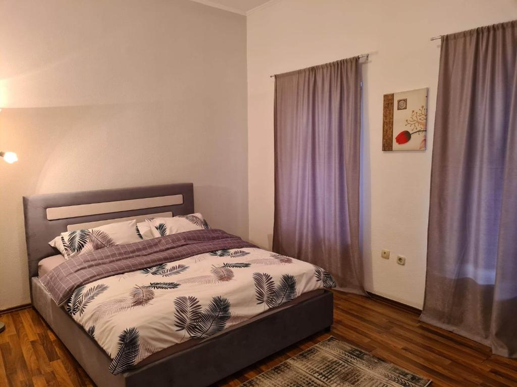 Postel nebo postele na pokoji v ubytování Stan Mostar-Mostovi