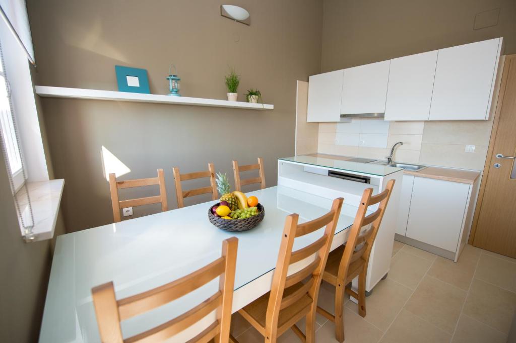 Kuchyňa alebo kuchynka v ubytovaní Apartments Gazebo