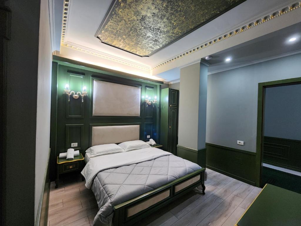 Postel nebo postele na pokoji v ubytování Hotel Lotus