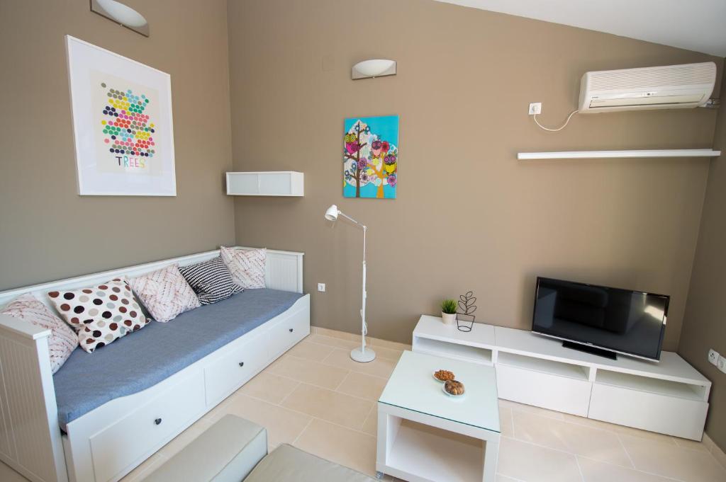 Televízia a/alebo spoločenská miestnosť v ubytovaní Apartments Gazebo