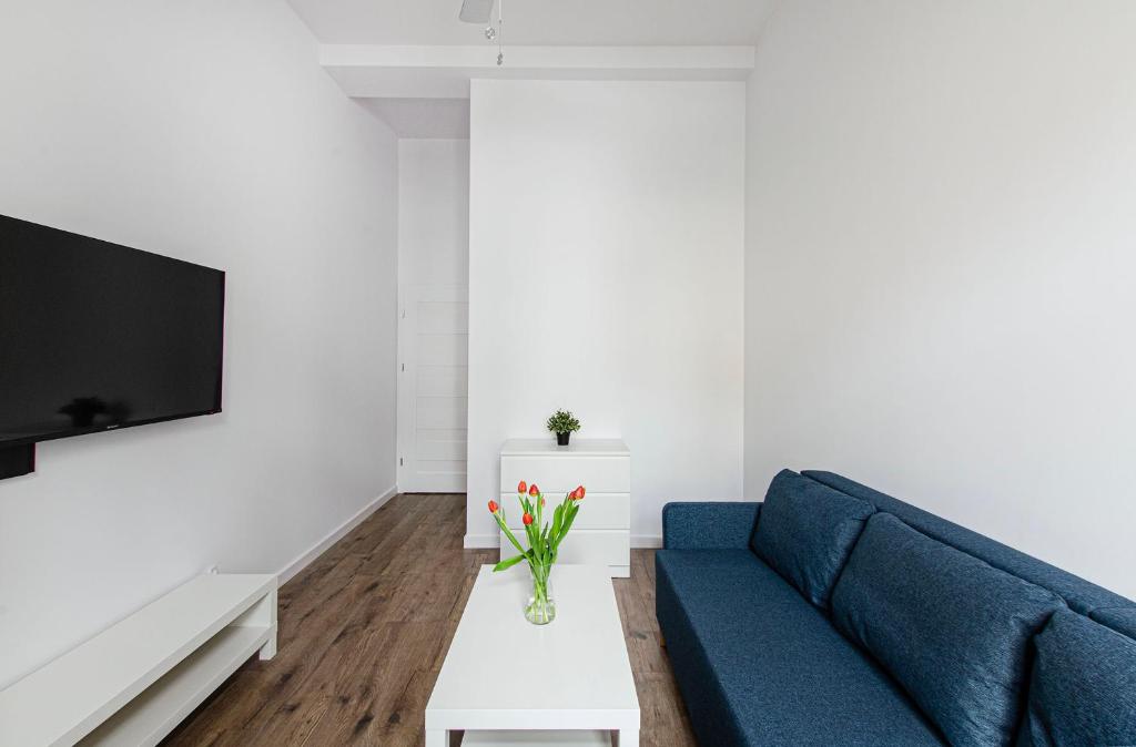 Televízia a/alebo spoločenská miestnosť v ubytovaní Smart Rental Management Apartments - CITY CENTER