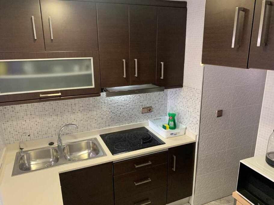 Kuchyňa alebo kuchynka v ubytovaní Precioso apartamento a 200 metros del mar