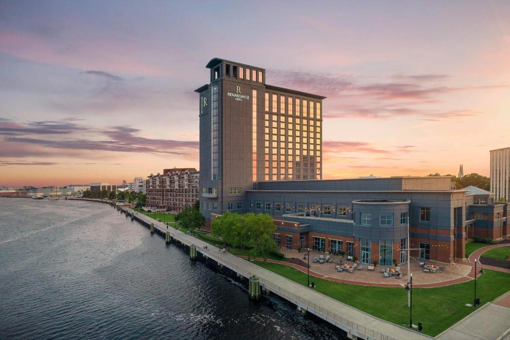 a rendering of a building next to a river at Renaissance Portsmouth-Norfolk Waterfront Hotel in Portsmouth