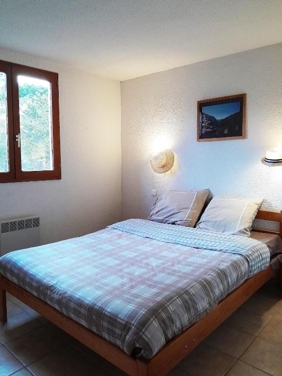 Postel nebo postele na pokoji v ubytování Evasion en pays Cathare