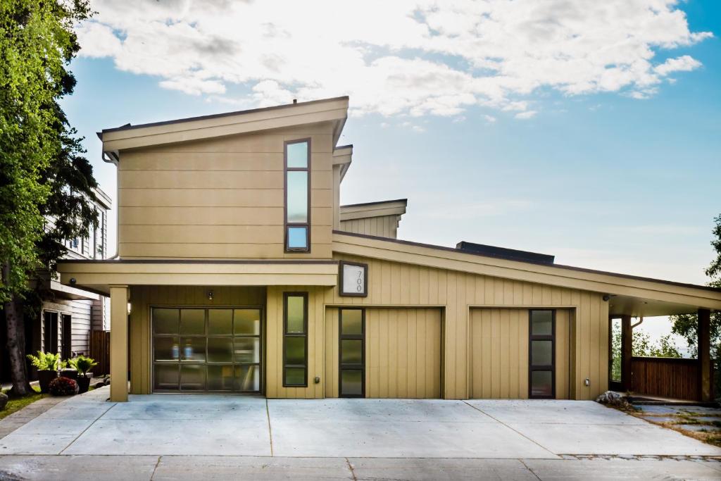 a large house with a garage at Downtown Contemporary - Full Property in Anchorage