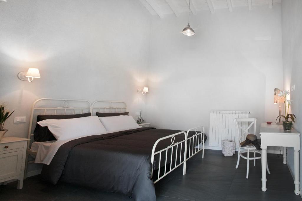 Posteľ alebo postele v izbe v ubytovaní Skipper White Guest House