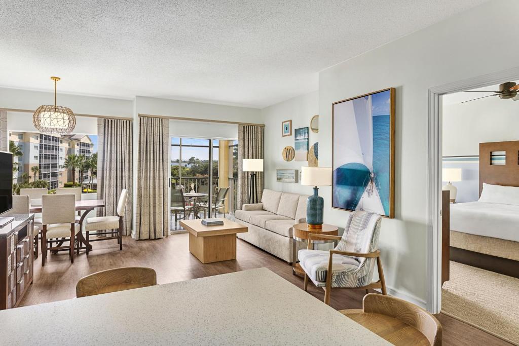 a living room with a bedroom and a living room at Marriott&#39;s Legends Edge at Bay Point in Panama City Beach