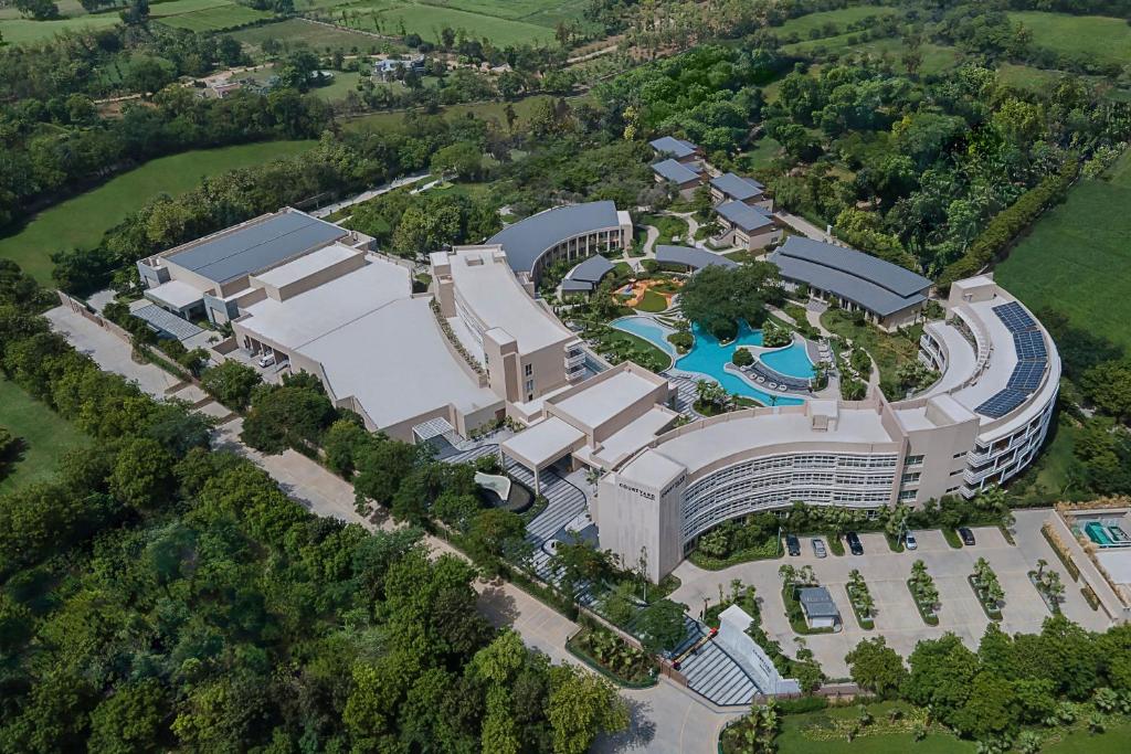 Chalet Hotels announced the acquisition of ‘COURTYARD BY MARRIOTT ARAVALI RESORT, NCR