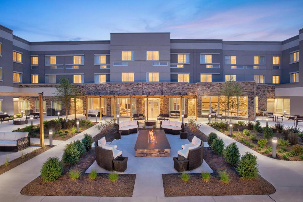 a rendering of the courtyard of a hotel at Courtyard by Marriott Wayne Fairfield in Wayne
