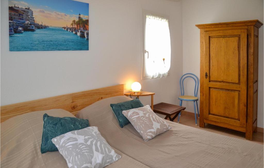Łóżko lub łóżka w pokoju w obiekcie 3 Bedroom Gorgeous Home In Portiragnes