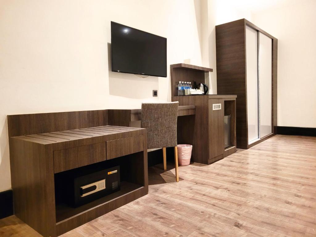 TV a/nebo společenská místnost v ubytování The NINES HOTEL Malacca